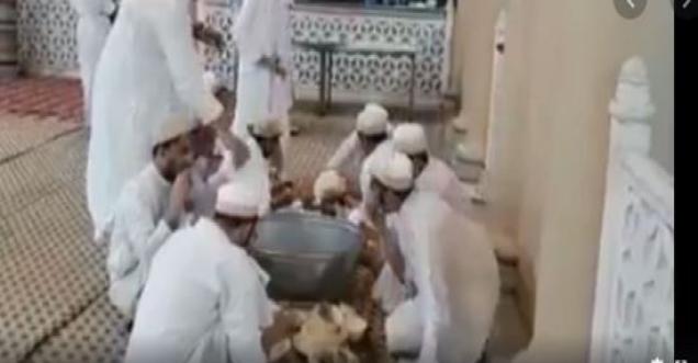 Fact Check: Video Shows Muslims Licking Utensils to Spread Coronavirus