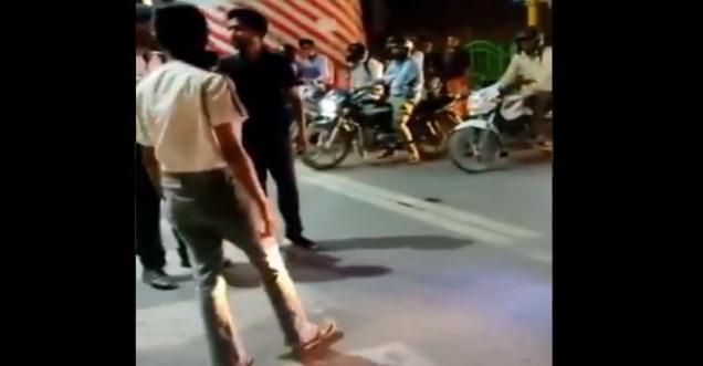 A girl in Yogi State thrashes a cab driver on the middle road police silent spectator