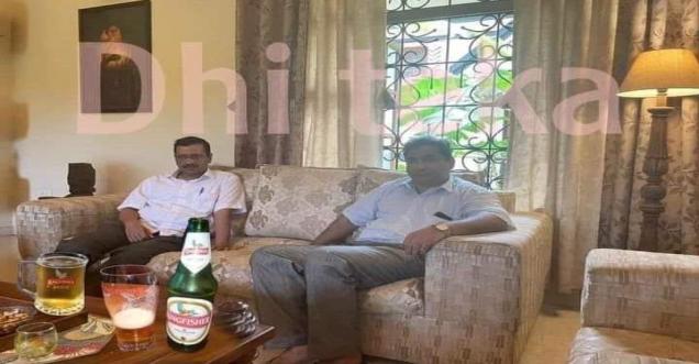Arvind Kejriwal pictures with Bear bottle in front of him viral